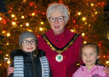 Woodley Christmas Lights Switch-on.

The Mayor, Cllr. Janet Sartorel with two of the winners in the Poster competition, Nessie (8) & Niamh Hearn (6).