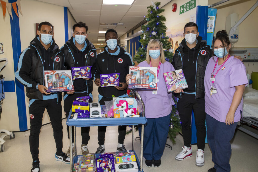 Reading FC players and staff hand out gifts while they visit the childrens ward at The Royal Berkshire Hospital in Reading. Pictures: JASONPIX