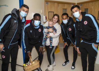 Reading FC players and staff hand out gifts while they visit the childrens ward at The Royal Berkshire Hospital in Reading.