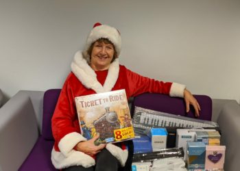 Gill Mckernan collecting gifts. Picture: courtesy of Giving Tree and Artizan Catering, Hurst