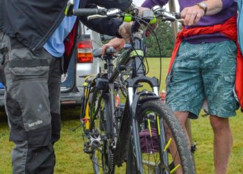 Twyford Together 5K and Fun RunsNeil Overton and Kate Overton-Hope have their bike checked by Gary Neilson (Dr. Bike).