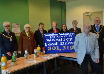 Ronnie Goodberry (front) presented gifts and certificates to thank various Woodley people and groups for their support during the pandemic Picture: Phil Creighton