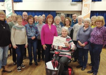 Sheila Butler from the MS Therapy Centre accepts a cheque from Wokingham Choral Society. PIcture: courtesy of WCS