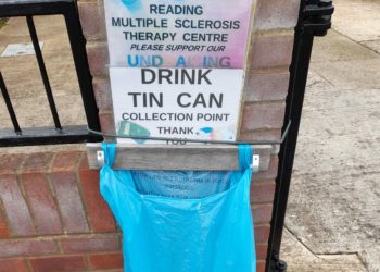 On the gate of a house near where I live hangs a blue binbag full of empty drinks cans.
