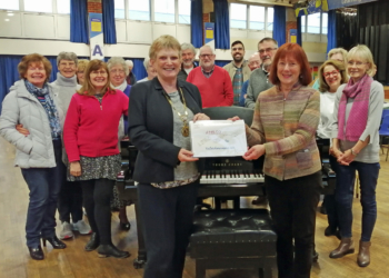 Members of Wokingham Choral Society presented a cheque to Wokingham Town Mayor Cllr Maria Gee, which will go to her charity of the year, Kaleidoscopic UK