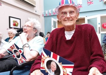 Residents and staff at Austen House celebrating the King's coronation Pictures: Austen House