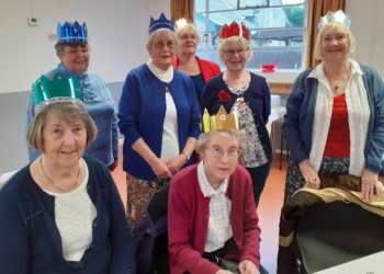 Members of the  Woodley Townswomen?s Guild wearing their crowns