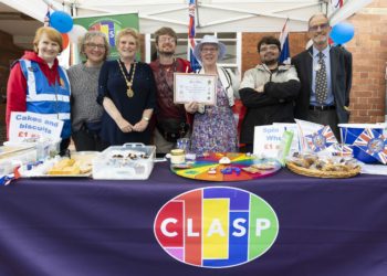 from left, Lions Club President, Claire Mangers-Page, Mayor Maria Gee present CLASP with the best stall prize. at the Wokingham May Fayre