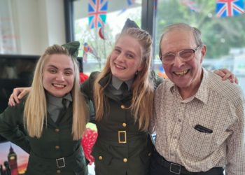 Prince Philip Duke of Edinburgh Court resident Michael posing with The D-Day Dollies after their performance