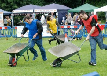 A popular event, the wheelbarrow race, returns to Winnersh Summer Fete this year. Picture: Steve Smyth