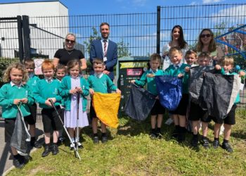 LITTER BIT AT A TIME: Alder Grove students, headteacher Mr Philip Theobald and members of the PCSA unveiled the school's new litter picking station at a lunchtime ceremony. Picture: Ji-Min Lee