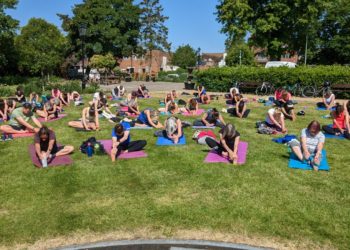 Some of the people taking part in a Park Yoga session in Howard Palmer Gardens. The event is held on Sundays and organisers are concerned about the impact of new parking fees