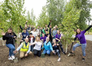 Some of the tree planting party from Thames Valley Park Picture: Stewart Turkington / www.stphotos.co.uk