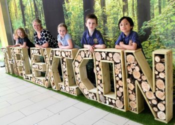 Hannah Brewer, founder of Little Muddy Boots is pictured with some of the pupils that helped make The Lexicon Bee Hotel