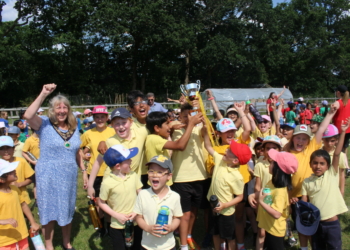 Earley Town Mayor, Cllr Caroline Smith celebrates with pupils in Lower Earley. Picture courtesy of Hawkedon Primary