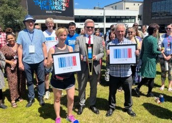 SHOW YOUR STRIPES: Cllr Sarah, executive member for climate emergency and residents services for Wokingham Borough Council (front left), Prof Robert Van de Noort, vice-chancellor of the University of Reading (middle), and Cllr John Ennis, lead councillor for climate strategy and transport for Reading Borough Council (front right), were present as the Running out of Time relay baton arrived at the University of Reading. Picture: Ji-Min Lee