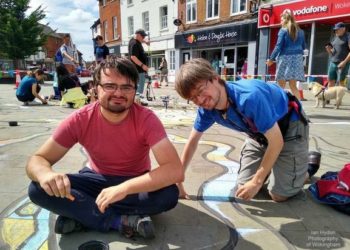 Local residents Martin Leamon (left) and Philip Pearce making their marks at the Chalk About It event in Wokingham on Sunday. Photo: Ian Hydon
