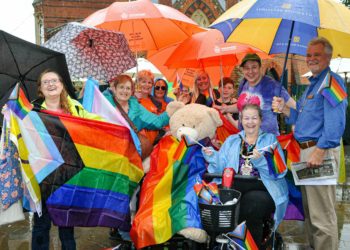 Show your stripes: attendeees waving the flag for Pride. Picture: Steve Smyth