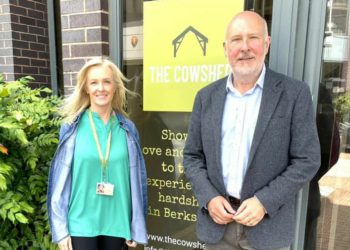 Rebecca Mole and Nick Burrows celebrating the support for The Cowshed from law firm Blandy & Blandy. Picture courtesy of Blandy & Blandy