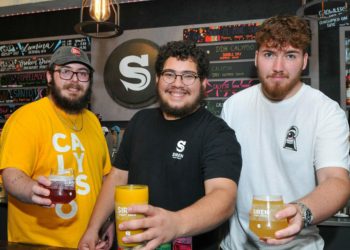 The Siren Craft Brew "Sessions and Sours" Event on Saturday.
Friendly staff members, Matthew Menear, Oliver Merrett and Harvey Web raise a glass.Picture: Steve Smyth