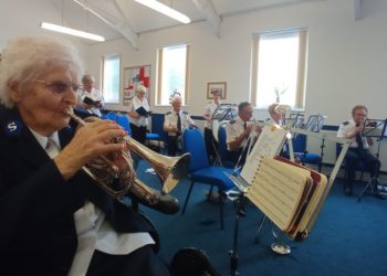 Valerie Handford is now a resident at Austen House care home in Lower Earley. They arranged for her to join the Salvation Army band at the Oxford Road citadel in Reading, playing the cornet during a service Pictures: Austen House