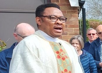 Father Jude Mbonu, who is moving from Twyford to Tilehurst, speaking at an earlier event