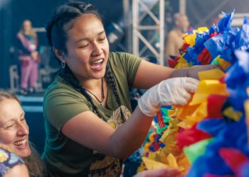 Greenbelt Arts Festival held a communion service where they invited participants to create paper flowers which were then brought together to create an artwork devised by Lower Earley based artist Emma Major Picture: MARK KENSETT/Greenbelt