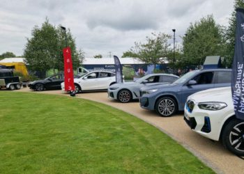 Tesla and BMW cars at the Electric Vehicle Open Day event on the green at Winnersh Triangle Picture: BD