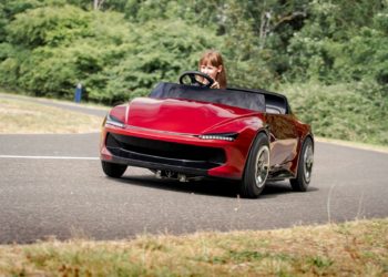 A youngster behind the wheel of the Firefly Sport from Young Driver