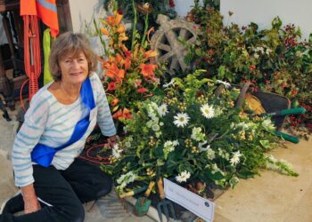 The All Saints Church Flower Festival in Wokingham at the weekend. PIcture: Steve Smyth



Pam Gilbey with the Churchyard arrangement.