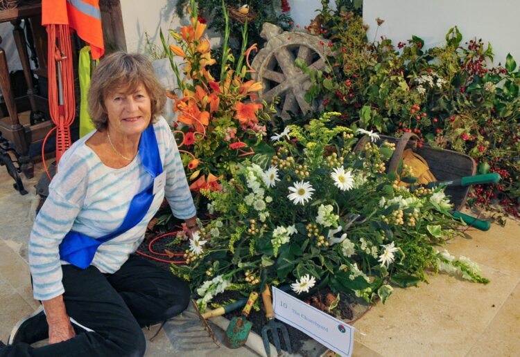 The All Saints Church Flower Festival in Wokingham at the weekend. PIcture: Steve Smyth



Pam Gilbey with the Churchyard arrangement.