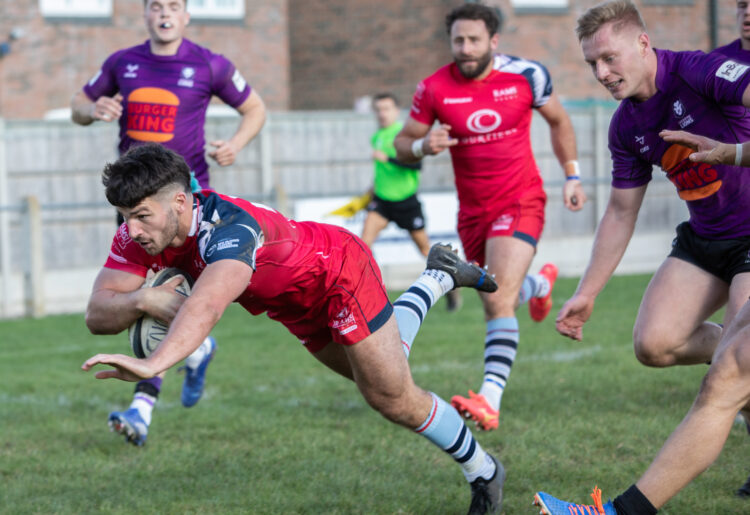 Zach Clow dives over for a try just before half-time