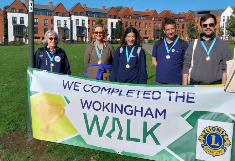 AT THE FINISH LINE: Wokingham?s Citizens Advice team celebrate completing the Wokingham Walk. The event will return in May Picture: Debbie Slay