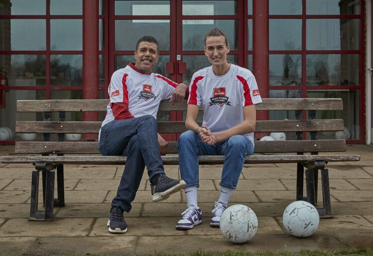 Howdens' Game Changer Programme ambassadors Chris Kamara MBE and Jill Scott MBE outside a grassroots football club. Pic: Kiran Ridley.