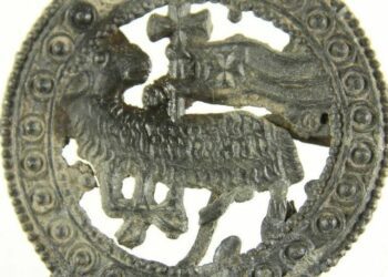 The Lamb of God can be seen alongside a Green cross banner on this medieval pilgrim badge. Picture: University of Reading