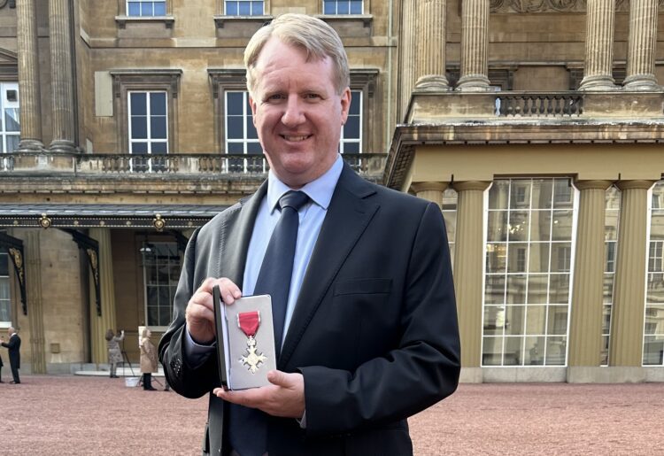 Ben Cowling with his MBE, in the grounds of Buckingham Palace Picture: Ben Cowling