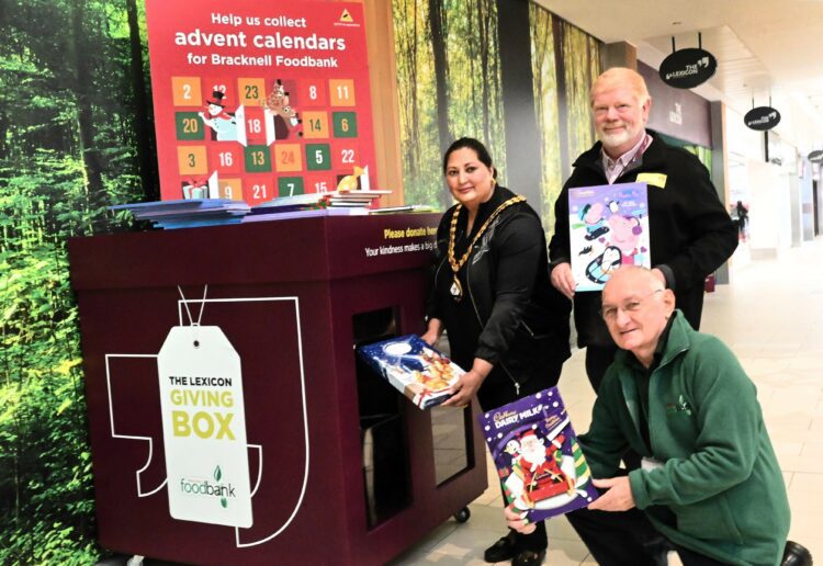 The Lexicon Advent Calendar Appeal runs until later this month and will ensure families can enjoy counting down to Christmas. From left: Cllr Naheed Ejaz, Mayor of Borough of Bracknell Forest, Sam Buckley, The Lexicon Operation Manager, and Kevin Foley from Bracknell Foodbank