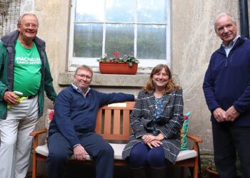 Philip and Rachel Jenkins (centre) were joined by Mark Clements and John Ward from the Central Berkshire Macmillan fundraising group for the unveiling of the bench dedicated to parents Brenda and Ralph. Picture: NHS