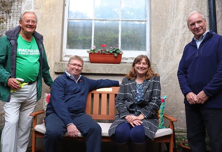 Philip and Rachel Jenkins (centre) were joined by Mark Clements and John Ward from the Central Berkshire Macmillan fundraising group for the unveiling of the bench dedicated to parents Brenda and Ralph. Picture: NHS