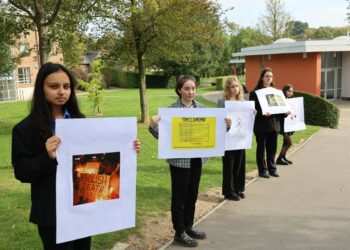 Members of Leighton Park's Amnesty International Group staged a silent protest against the death penalty. Picture: Leighton Park School