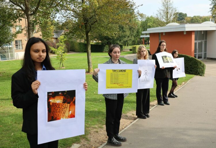 Members of Leighton Park's Amnesty International Group staged a silent protest against the death penalty. Picture: Leighton Park School