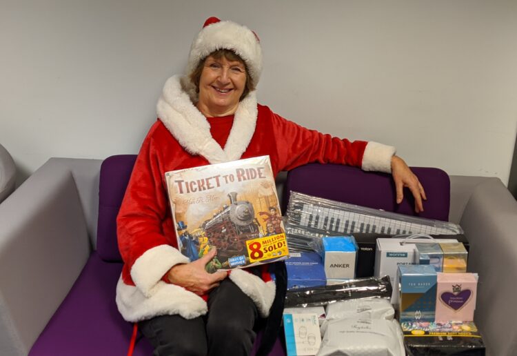 Gill Mckernan collecting gifts. Picture: courtesy of Giving Tree and Artizan Catering, Hurst