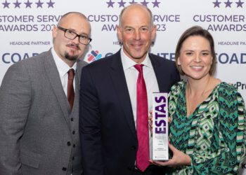 The team from Simmonds Mortgage Services with television personality Phil Spencer.