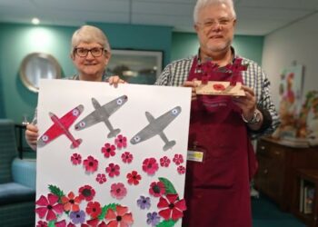 Residents of Austen House in Lower Earley making a poppy display