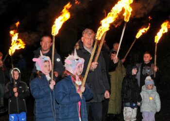 The torches ensured no-one was left feeling too cold. Picture: Steve Smyth