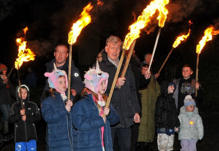 The torches ensured no-one was left feeling too cold. Picture: Steve Smyth