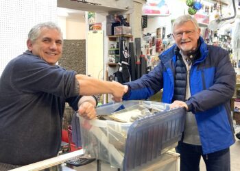 Customer Tony Climie, right, shook KC Sports owner Andrew Stemp's hand. PIcture: Emma Merchant
