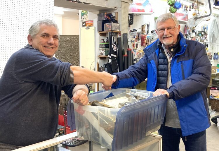 Customer Tony Climie, right, shook KC Sports owner Andrew Stemp's hand. PIcture: Emma Merchant