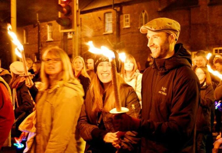 The torchlit procession will leave from Market Place. Residents carry flaming torches in the 2015 event. Picture: Phil Creighton