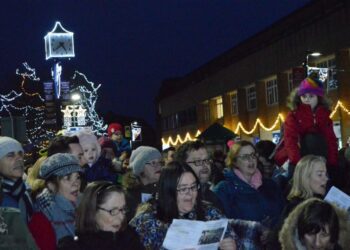 Carol singing at the Woodley Christmas light switch-on in 2018